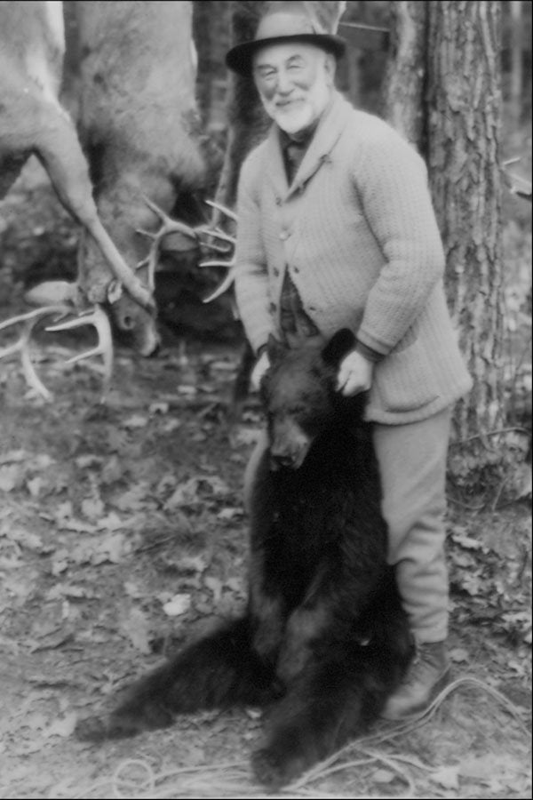 713076 Man With Dead Bear A4 Photo Print