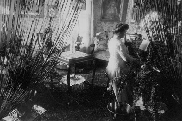 713081 Lady Playing Piano In Parlor A4 Photo Print