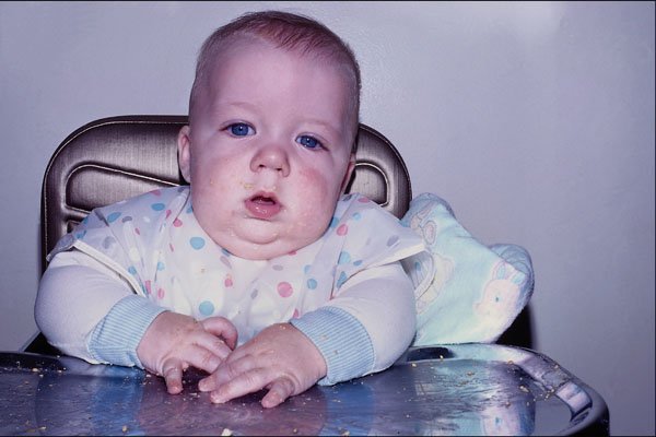 716015 Infant In His Highchair A4 Photo Print