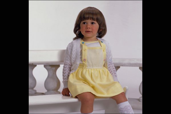 716032 Little Girl Sitting On A Garden Bench A4 Photo Print