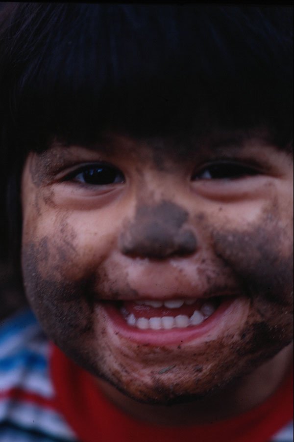 716043 Girl With Face Covered In Mud A4 Photo Print
