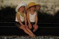 716060 Two Little Girls With Hats A4 Photo Print