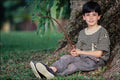 716077 Boy Next To Tree A4 Photo Print