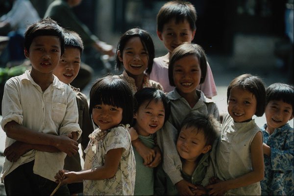 716099 Children Outside Restaurant A4 Photo Print