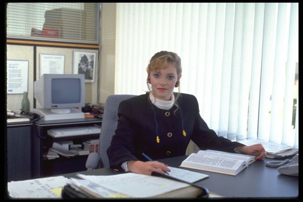 719001 Woman At Office Desk A4 Photo Print