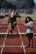719034 Businessman Jumping Hurdle With Help From Secretary A4 Photo Print