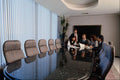 719046 Executives In Conference Room A4 Photo Print