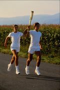 722057 Runners Carrying The Torch A4 Photo Print