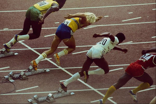 722058 Track And Field, Runners Leaving The Starting Block A4 Photo Print
