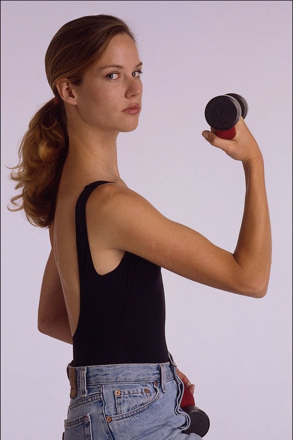 722071 Female Model In Leotard And Jeans, Lifting Barbell A4 Photo Print