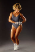 722081 Girl Wearing A Gray Workout Outfit A4 Photo Print