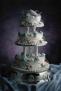 724095 Wedding Cake, Blue And Pink On Silver Base A4 Photo Print