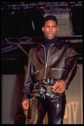 725066 Male In Brown Leather Jacket And Snakeskin effect Trousers A4 Photo Print