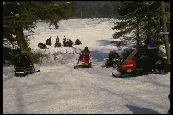 728068 Where Land, Lake And Snowmobiles Meet A4 Photo Print