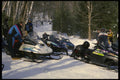 728075 Snowmobilers Gather To Converse A4 Photo Print