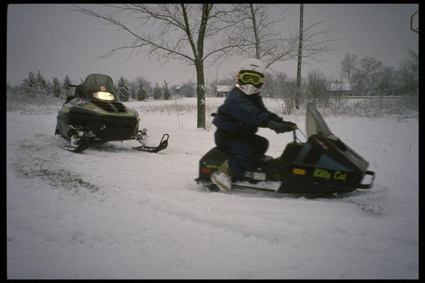 728080 Young Snowmobiler A4 Photo Print