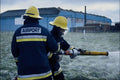 730085 Two Airport Firemen, Discharging Foam A4 Photo Print