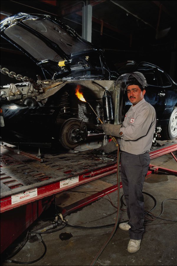 730094 Industrial Worker With Flame, Fixing Car, Orange County, California, U.S.A. A4 Photo Print