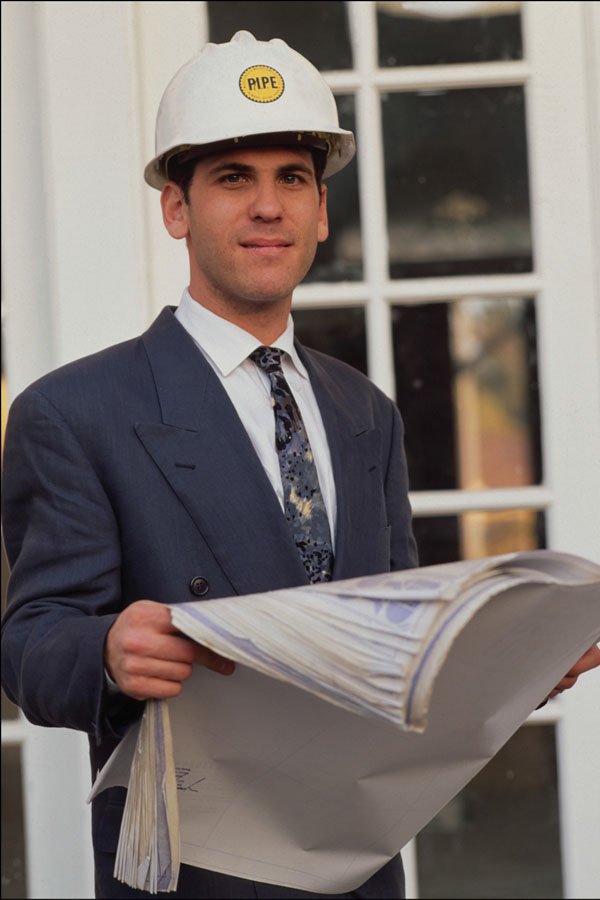 730095 Male General Contractor At Job Site With Blue Prints, U.S.A. A4 Photo Print