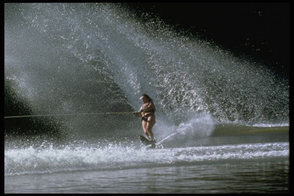 732064 Slalom Waterskier, Silhouetted In Spray A4 Photo Print