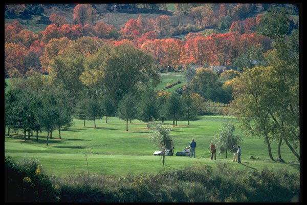735042 Golfers With Fall Foliage In Background, Queechee, Vermont, U.S.A. A4 Photo Print