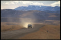 735054 Truck On Dirt Road In Western Canada A4 Photo Print