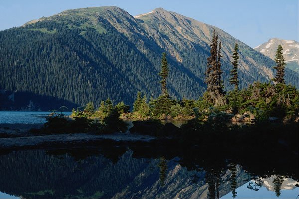 737021 Reflection Of Mountains In A Lake, British Columbia, Canada A4 Photo Print