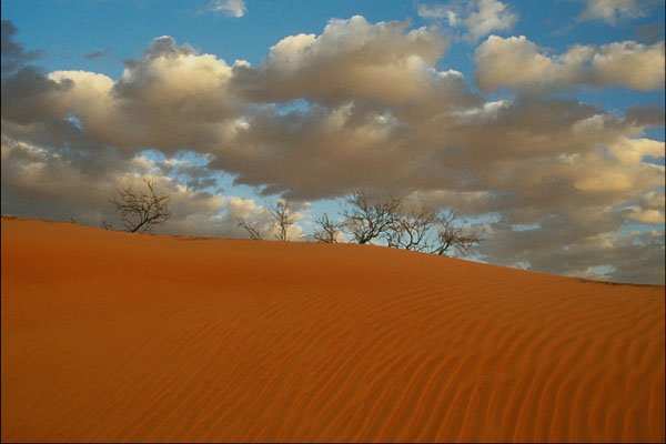 739051 Sunrise With Clouds In The Sands A4 Photo Print