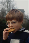 744060 Young Boy Eating Biscuit A4 Photo Print