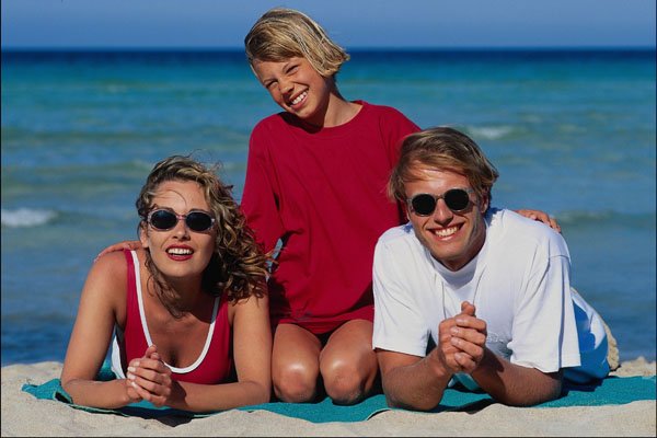 745075 Family Posing On Beach A4 Photo Print