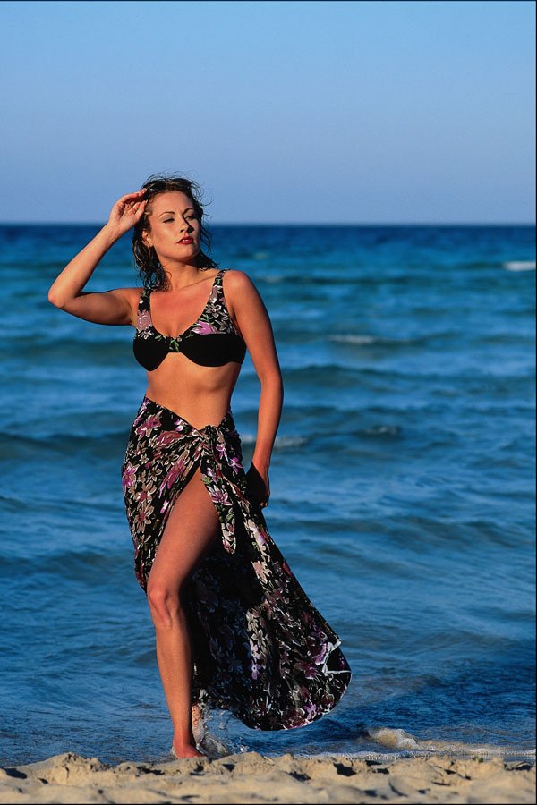 745077 Woman In Sarong, On Beach A4 Photo Print