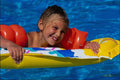 745081 Child In Pool With Water Wings A4 Photo Print