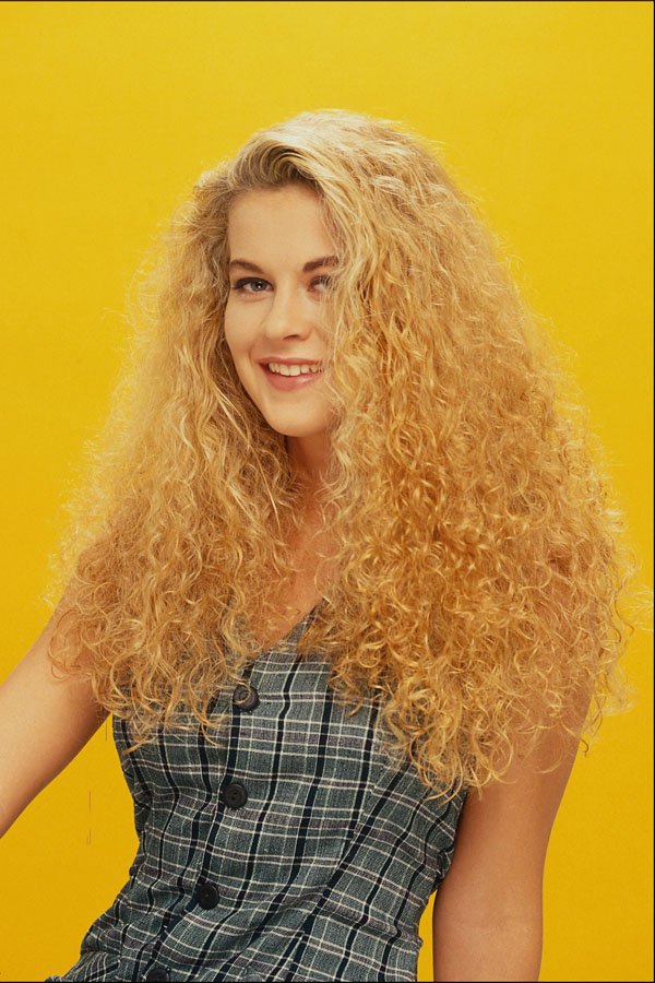 746052 Blonde With Long Hair On Mustard Background A4 Photo Print