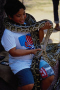 747016 Tourist Plays With Snake, Thailand A4 Photo Print