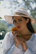 748047 Girl In Hat Holding Orange Flower A4 Photo Print