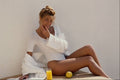 748098 Maria, Blonde Sitting On Step, By White Wall A4 Photo Print