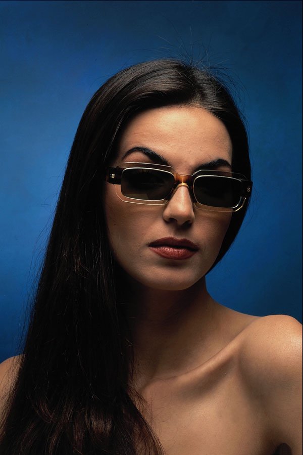 749045 Portrait Of A Brunette Wearing Sunglasses A4 Photo Print