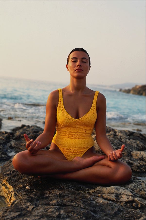749046 Model In Lotus Position, Meditating By The Seaside A4 Photo Print