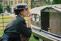749050 Lady Using Grill Of Rolls Royce As Mirror A4 Photo Print