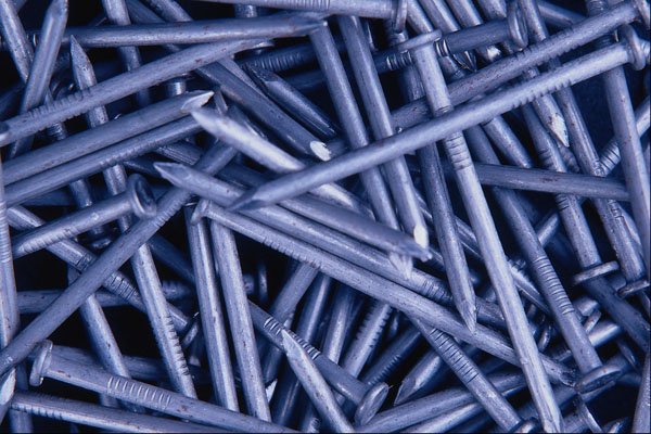751090 Background Of Two inch Nails A4 Photo Print