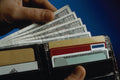 760083 Wallet In Hand A4 Photo Print