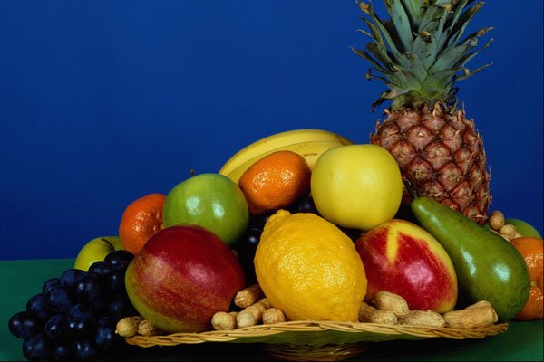 761044 Basket Of Fruit, Blue Background A4 Photo Print