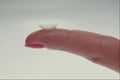 763012 Finger Holding A Contact Lens A4 Photo Print