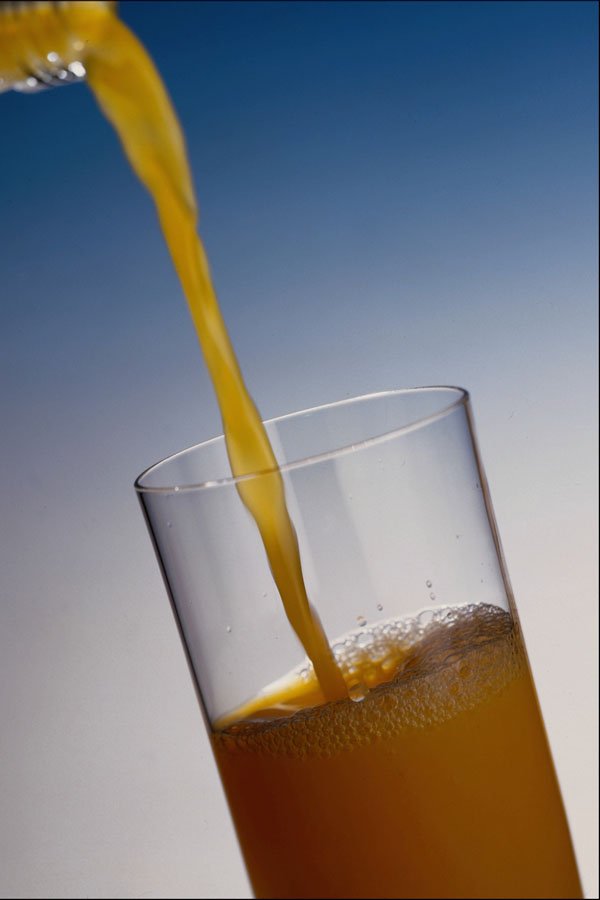 764023 Orange Juice Poured Into Glass A4 Photo Print
