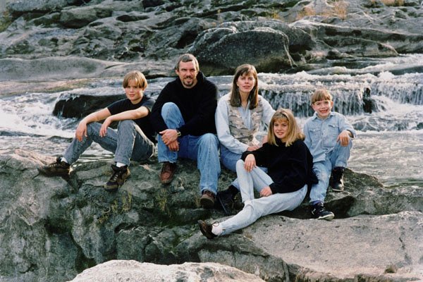 766020 Family Of Five On The Rocks A4 Photo Print