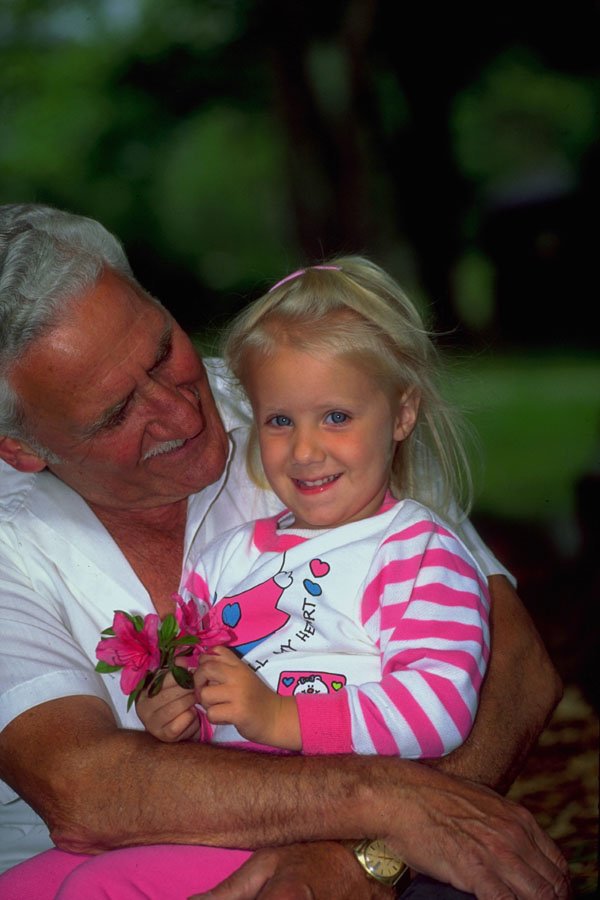 766026 Grandfather Holding His Granddaughter, New York, U.S.A. A4 Photo Print