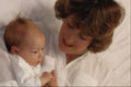 767074 Mother With Very Young Baby In Bed A4 Photo Print