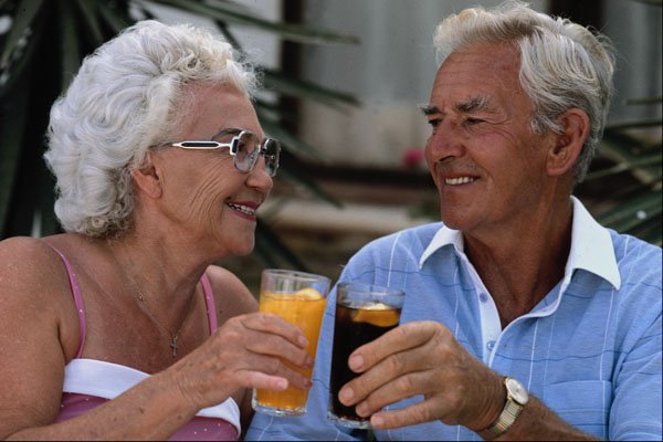 767089 Retired Couple Toasting A4 Photo Print