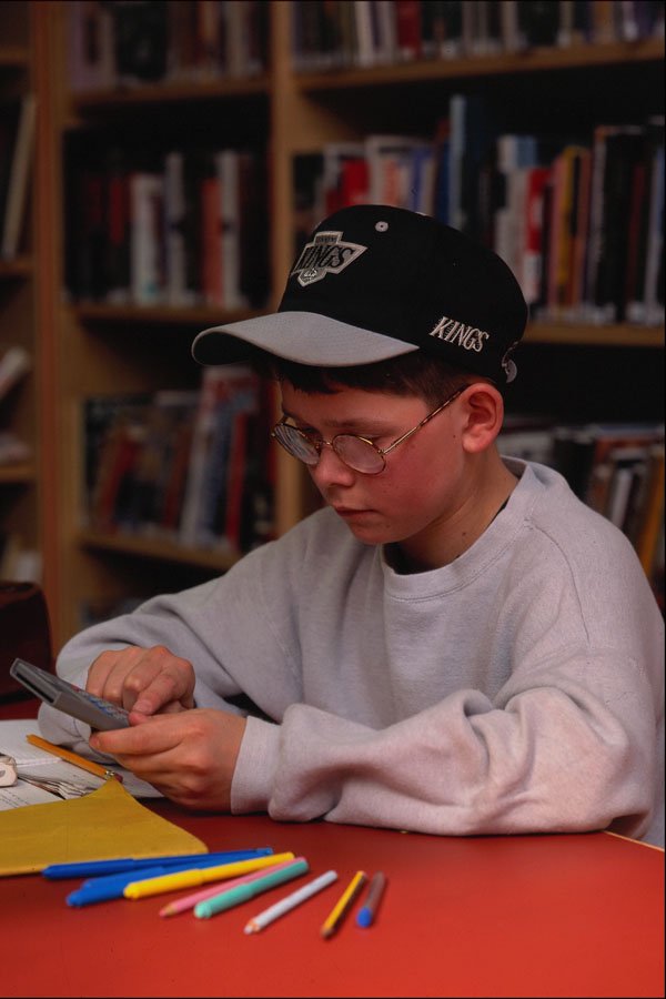 769005 Student At Work A4 Photo Print