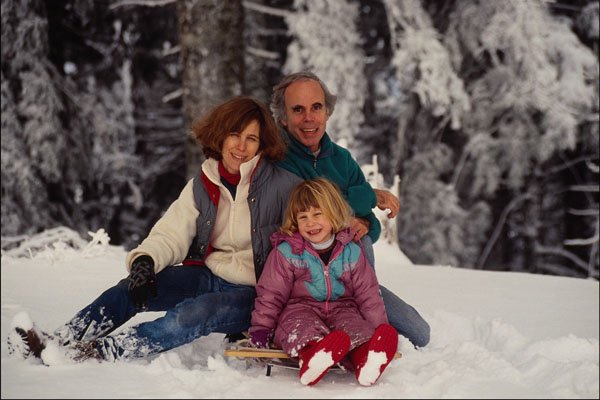 769013 Mother, Father And Daughter Sitting In Snow, Coast Range, Oregon, U.S.A. A4 Photo Print